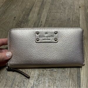 kate spade metallic rose gold zip-around wallet